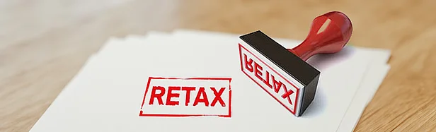 Stempel mit Aufschrift Retax