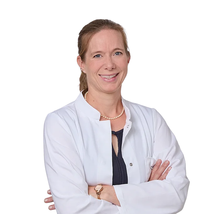 Apothekerin in weißem Kittel